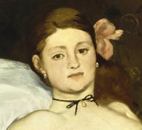 Olympia (detail) by Édouard Manet was a succès de scandale when it was first exhibited at the Paris Salon of 1865, depicting a courtesan gazing at her viewer.