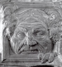 Grotesque mask for  La Porte de Parsifal. (c. 1891) by French sculptor Jean-Joseph Carriès